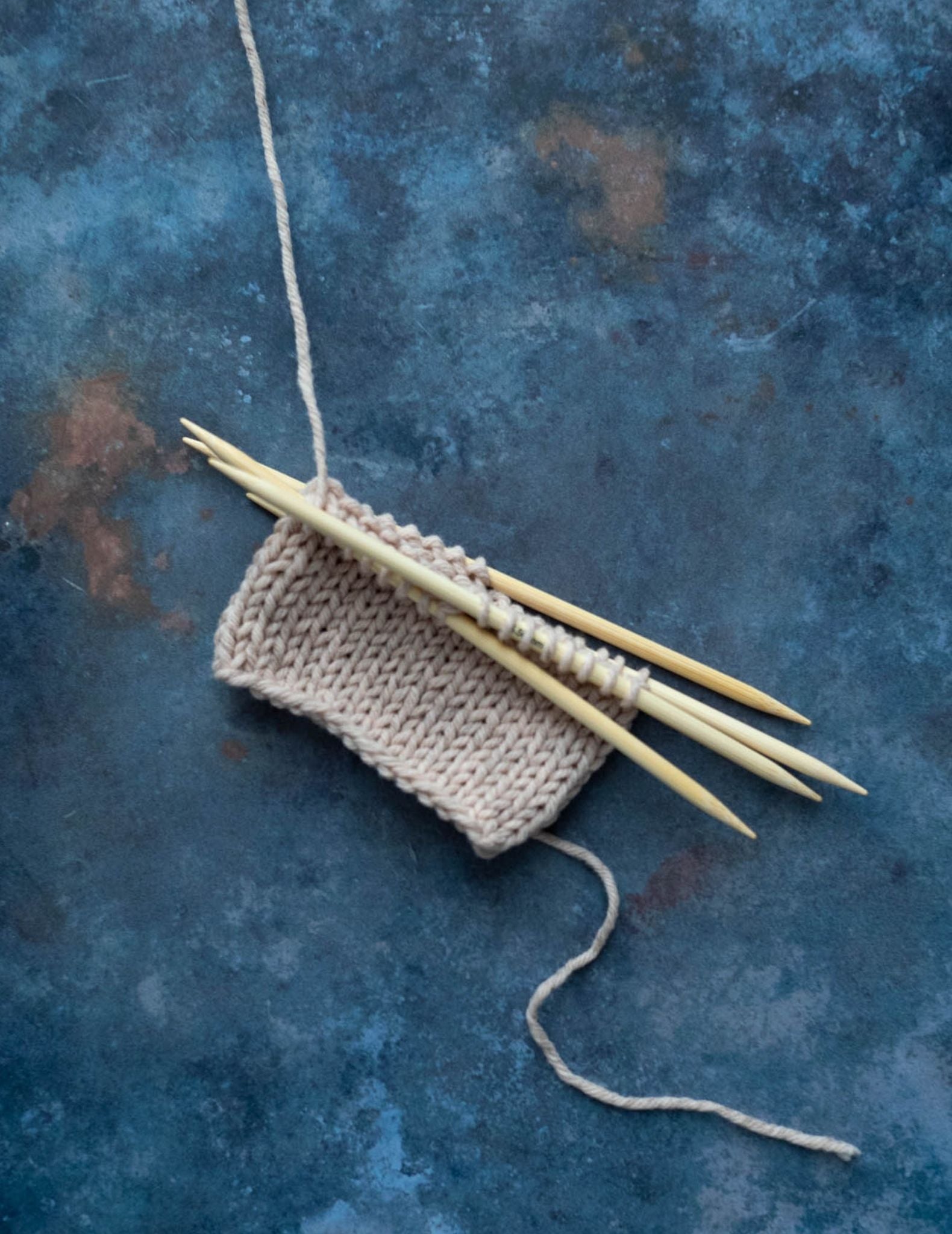 How to knit in the round with double-pointed needles?, by The Mindful  Collection